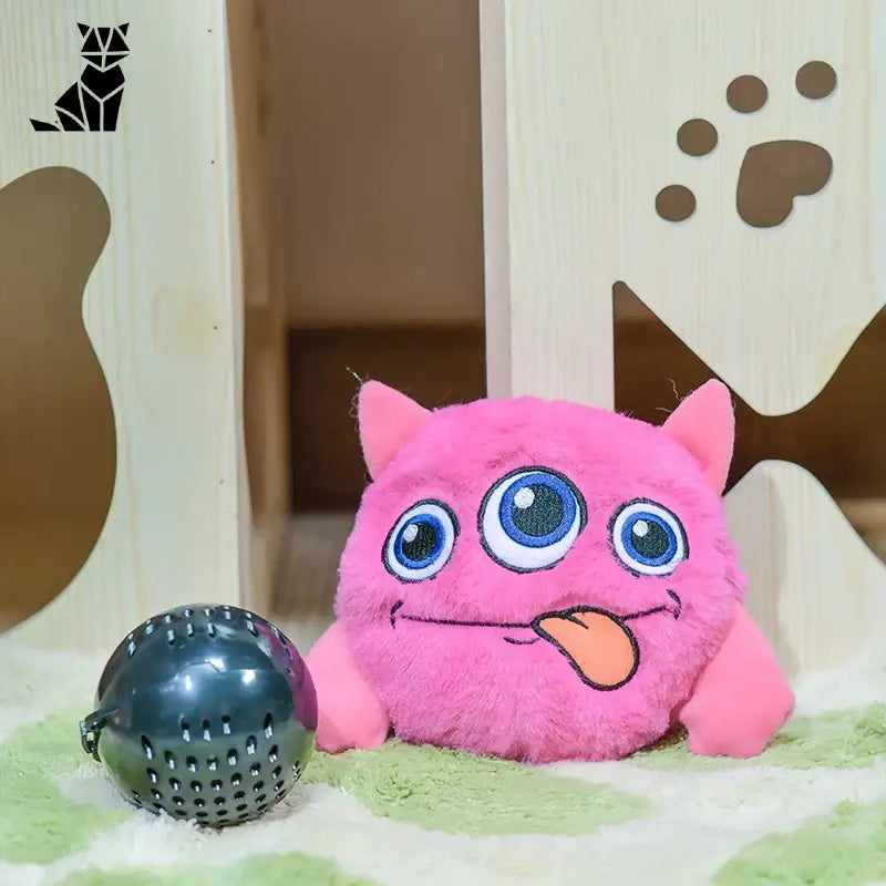 Animal en peluche rose avec balle de stimulation noire - Interactive Vibrating Balle